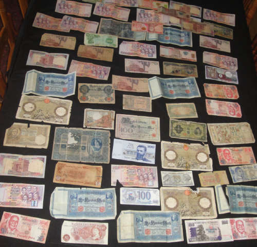 Sixty plus (60+) old World Banknotes in mostly under average condition
