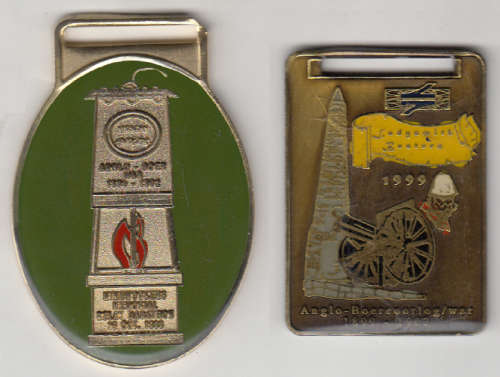 Two metal badges commemorating the Anglo Boer War 1899-1999