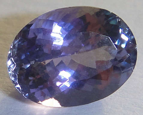1.75 Oval Intense Bluish Violet with Greenish Blue Flashes Natural Tanzanite (GISA Certificate: Valu
