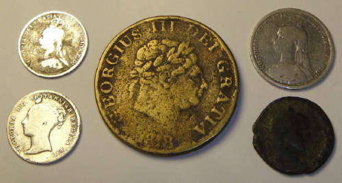 Four old Coins from Great Britain (1800s) and an unidentified Roman coin