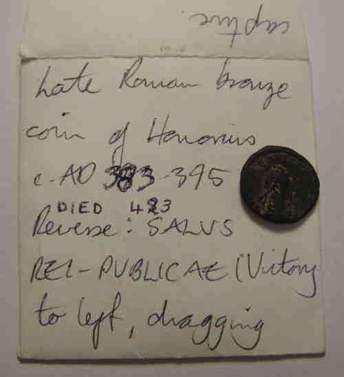 Ancient Rome: Roman Bronze Coin of Emperor Honorus who ruled 393--423 AD.