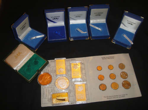 Gold & Silver Cladded Bars with some other items including SAM Coin Boxes