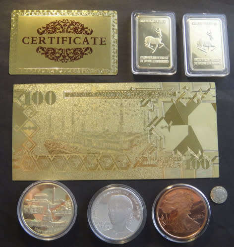 Collection of Capsulated Medallions and a Gold-Foil Note