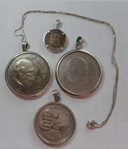 Four Sterling Silver Pendants set with Coins