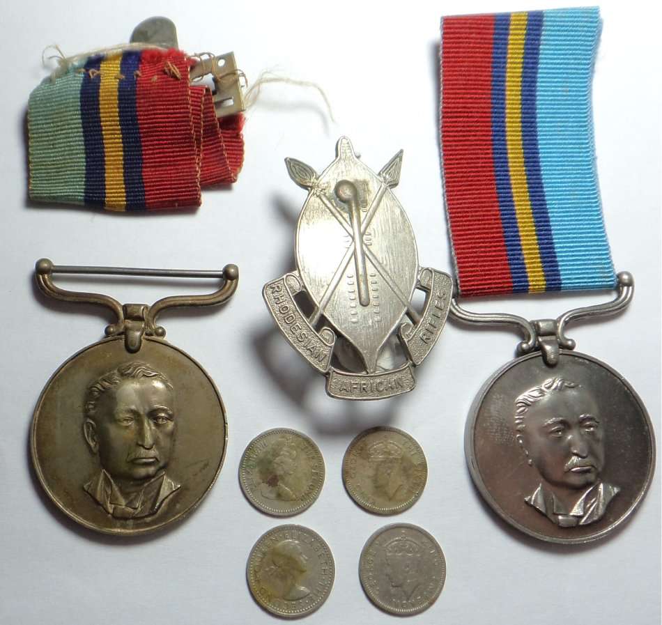 Two Rhodesian Service Medals plus Rhodesian African Rifles Badge