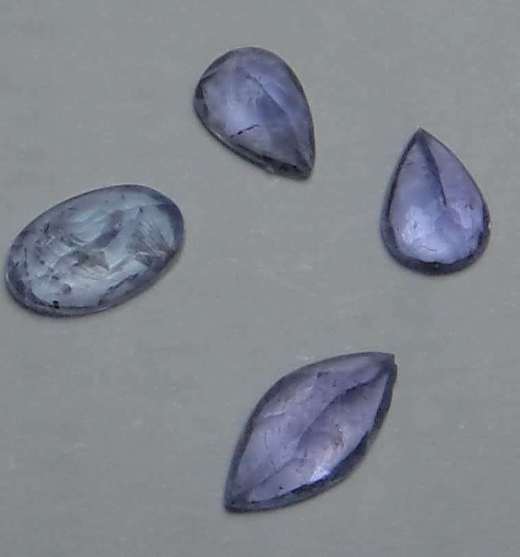Four smaller Tanzanite Stones (0.75ct in total)