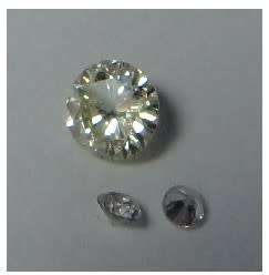 0.23 carat Diamond plus two smaller ones