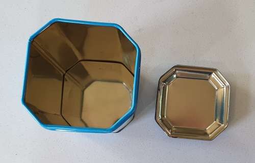 NESTLE tin as per photos