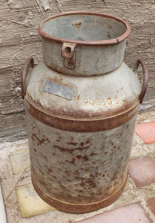 Vintage milk can as per photos