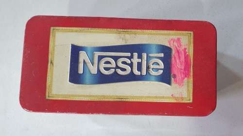 Nestle tin as per photos