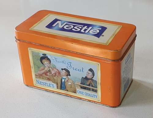 NESTLE treat tin as per photos