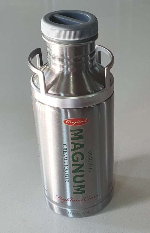 MAGNUM cream liqueur tin as per photos