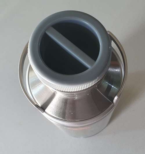 MAGNUM cream liqueur tin as per photos