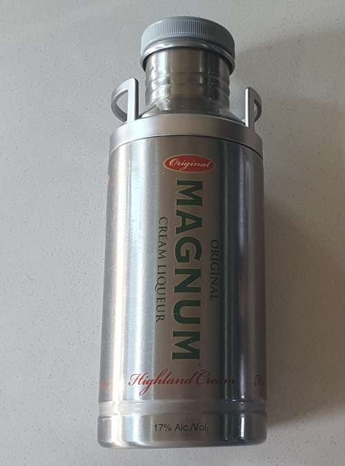 MAGNUM cream liqueur tin as per photos