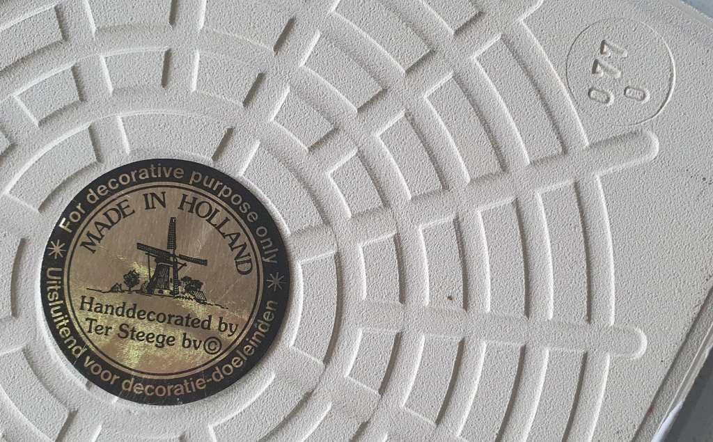 Hand decorated tile - made in Holland as per photo.