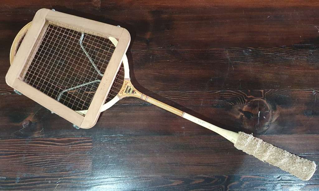 Vintage wooden Spalding badminton racket as per photo.