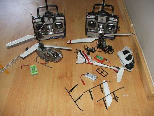 Job lot!! 2 x Nine Eagles helicopters in parts with receivers.