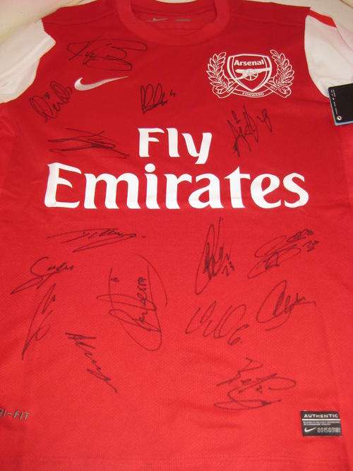 Arsenal squad signed 2011-12 new home shirt