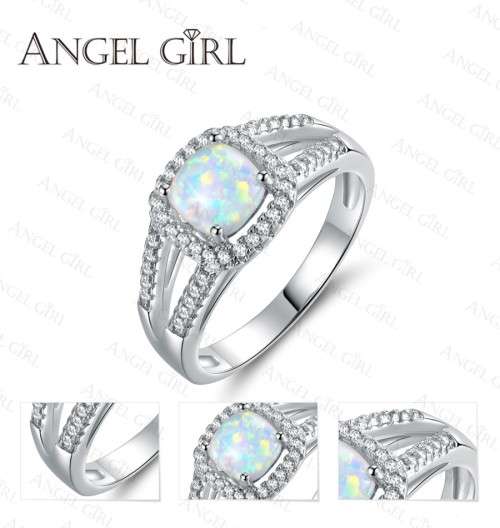Exquizite Queen ring with simulated Fire Opal and white gold polish