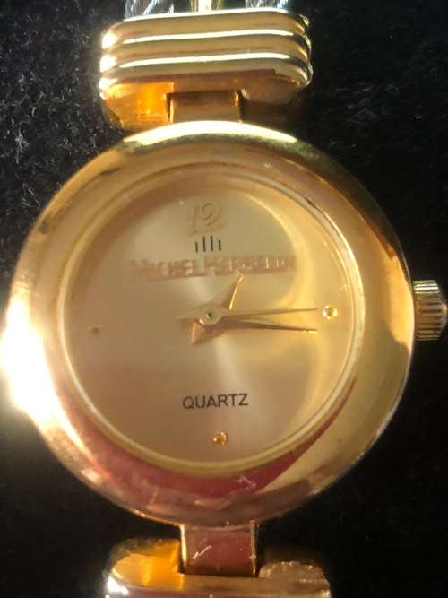 Elegant ladies gold plated quartz Cable bracelet watch