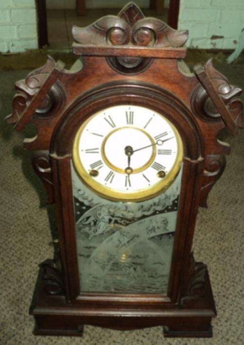 OLD ANSONIA WOODEN CLOCK. VERY DIFFERENT