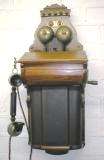 old wall mounted telephone 1907? see date on Stamp