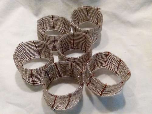 I HAVE AN AWESOME SET OF 6 BEADED SEVIETTE RINGS - GREAT ADDITION TO YOUR DINNER TABLE!!