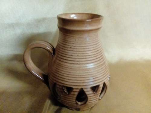 I HAVE A REAL NICE POTTERY CANDLE HOLDER - SUCH A BEAUTIFUL PIECE!!!!