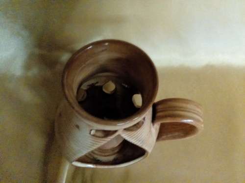 I HAVE A REAL NICE POTTERY CANDLE HOLDER - SUCH A BEAUTIFUL PIECE!!!!