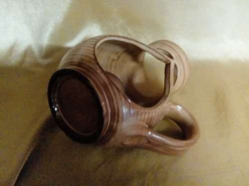 I HAVE A REAL NICE POTTERY CANDLE HOLDER - SUCH A BEAUTIFUL PIECE!!!!