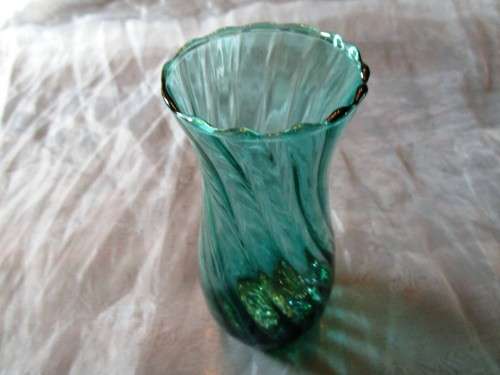 I HAVE SUCH A STUNNING GREEN GLASS VASE - REAL NICE PIECE!!!!