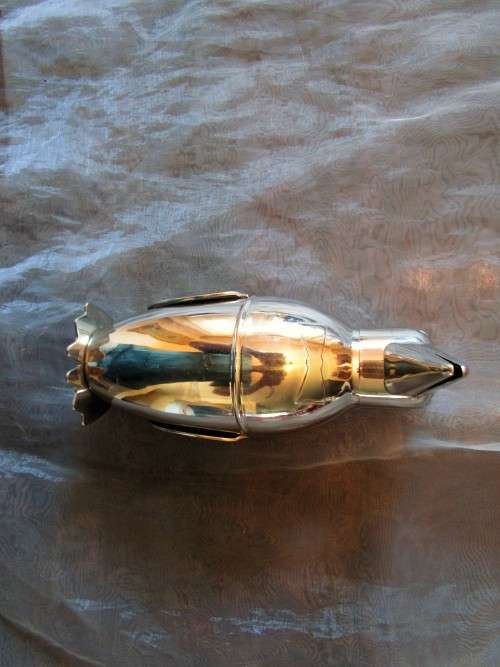 I HAVE A STUNNING STEEL PENGIUN SHAPED DRINKS SHAKER - SUCH AN EXQUISITE PIECE!!