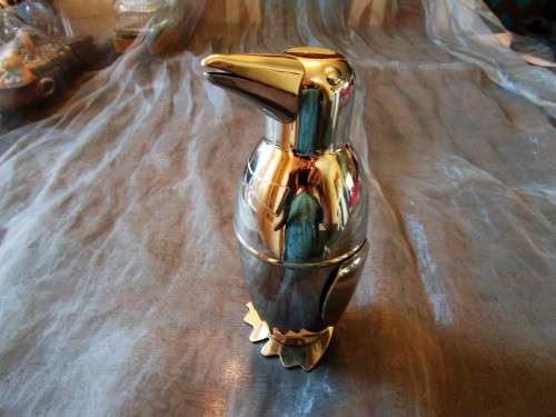 I HAVE A STUNNING STEEL PENGIUN SHAPED DRINKS SHAKER - SUCH AN EXQUISITE PIECE!!