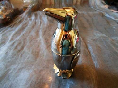I HAVE A STUNNING STEEL PENGIUN SHAPED DRINKS SHAKER - SUCH AN EXQUISITE PIECE!!