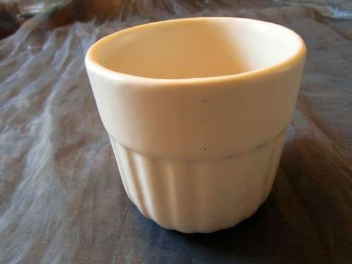 I HAVE A BEAUTIFUL CREAM CERAMIC PLANT POT - REAL NICE PIECE!!!!
