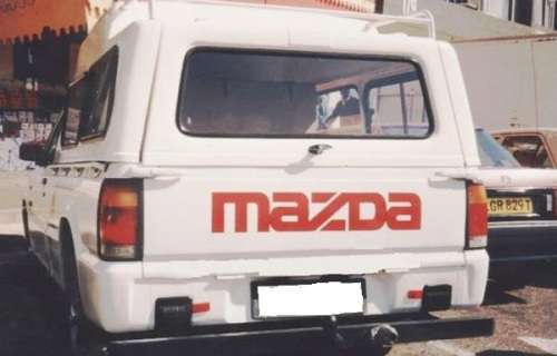 MAZDA B2000 86- TAIL LAMP LEFT RIM ASSY