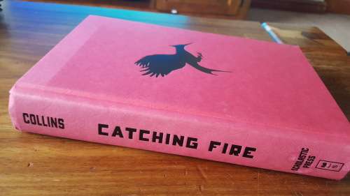 Catching Fire (The Hunger Games #2) by Suzanne Collins - Hardcover
