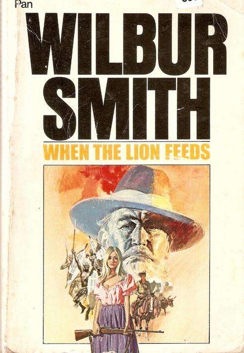 WHEN THE LION FEEDS BY WILBUR SMITH(S/C)