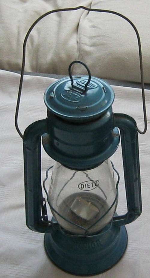 OLD DIETZ LANTERN WITH CANDLE (29CM LONG)
