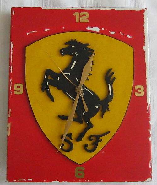 FERARRI TILE CLOCK (+-25CM BY +-20CM)NOT TESTED