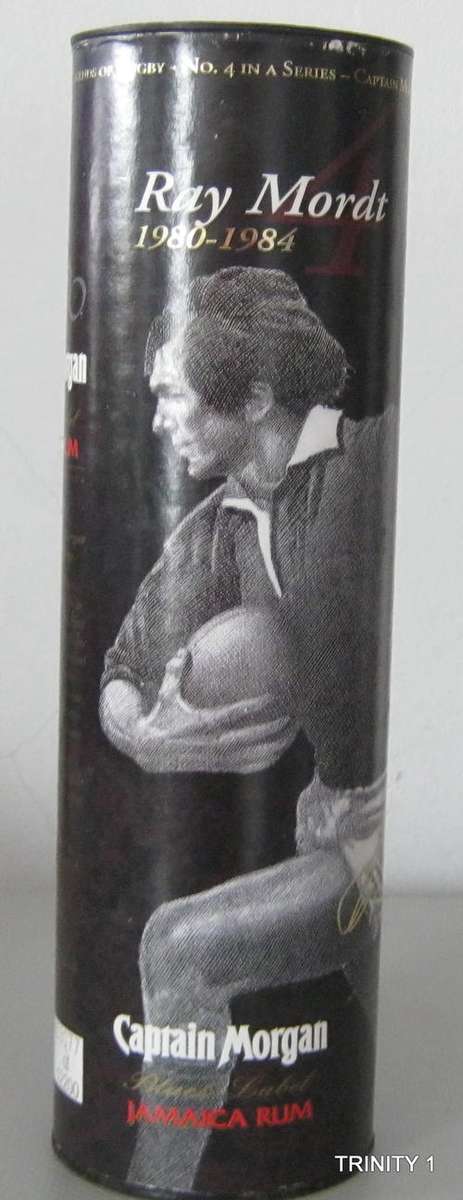 CAPTAIN MORGAN LEGENDS OF RUGBY TIN WITH PIC OF RAY MORDT 1980 - 1984 (32CM LONG)