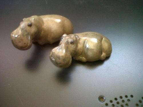 Stone carved hippos - one set (two hippos)