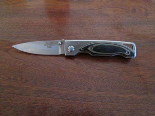 BENCHMADE SIDE-LOCK FOLDING KNIFE.