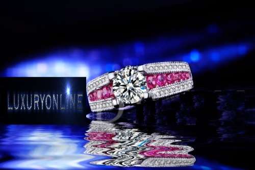 Stunning Ring With 41 Simulated 1.00ct Diamonds And 12 Rubellites