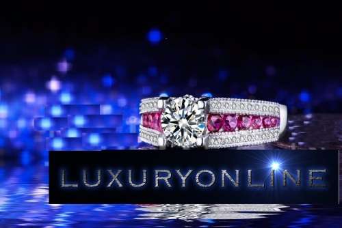 Stunning Ring With 41 Simulated 1.00ct Diamonds And 12 Rubellites