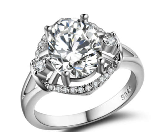 STUNNING! Ring 25 Simulated Diamonds Size 6 US