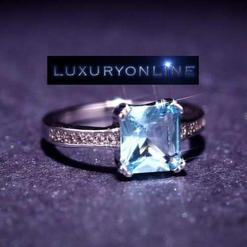 Simulated Aquamarine And 1,28ct Simulated Diamonds