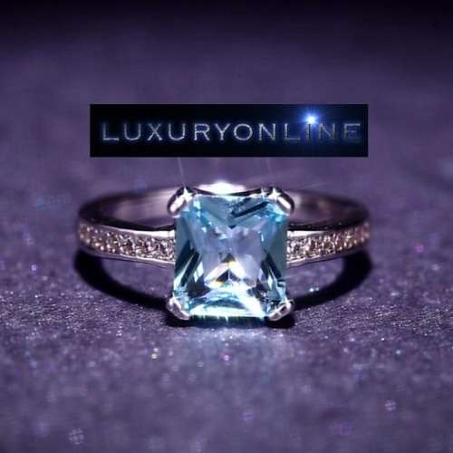 Simulated Aquamarine And 1,28ct Simulated Diamonds