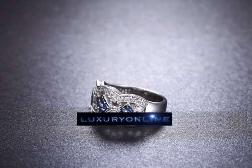White Gold Filed Ring With 44 Simulated Diamonds And 12 Simulated Sapphires