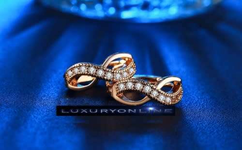 SPLENDID! Infinity Hoop Earrings With 9 0,25 Carrot Simulated Diamonds